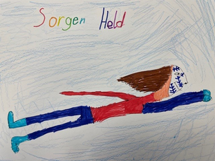 Kinderzeichnung: fliegendes Kind als Superheld